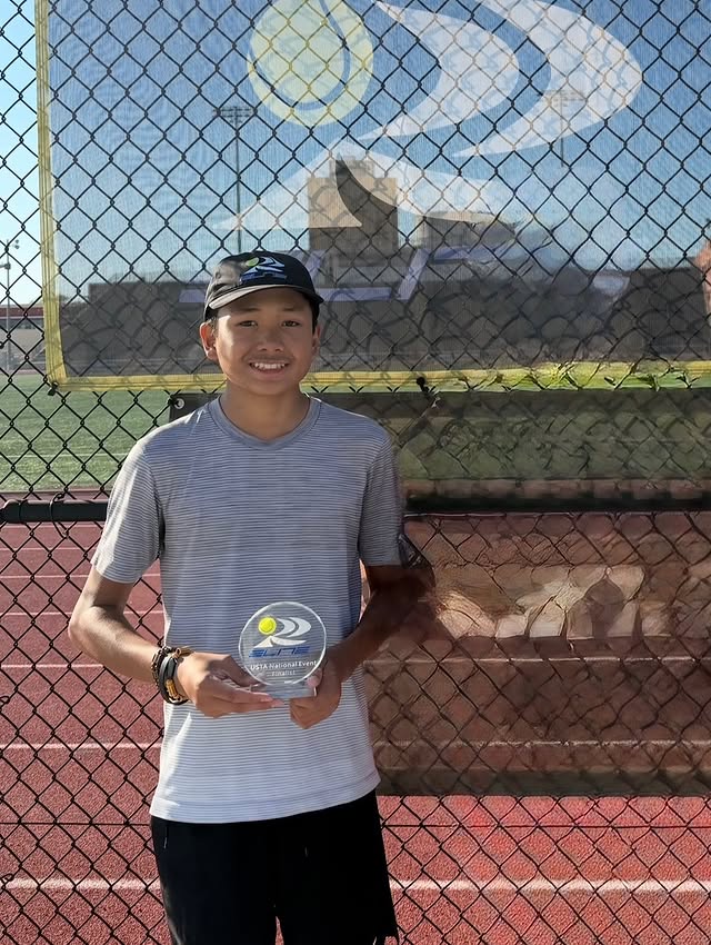 Junior player with USTA award